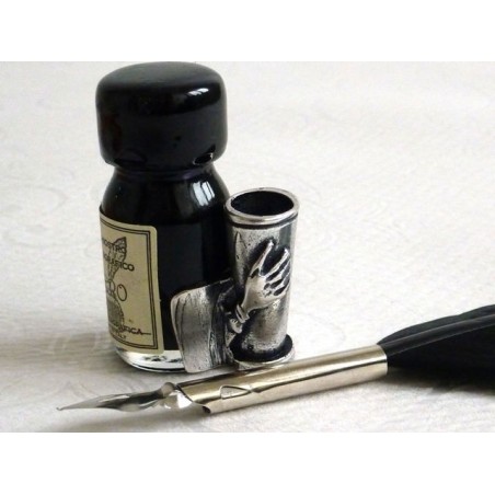 Close-up of small black quill pen and pewter holder by La Kaligrafica